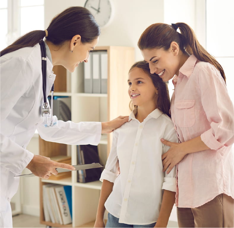 Mother and daughter with healthcare provider